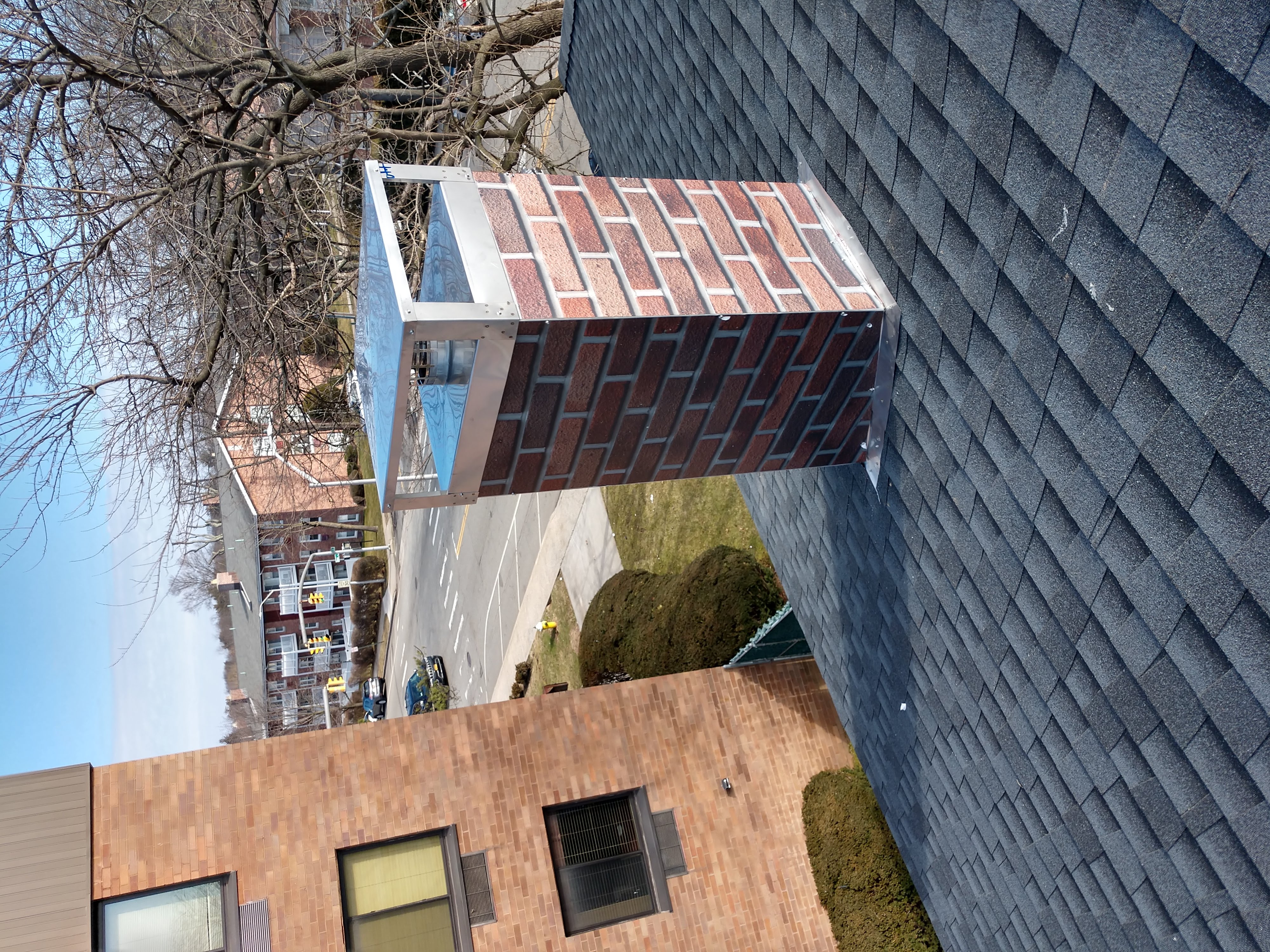 New elastomeric sealant applied to chimney crown in East Meadow, NY