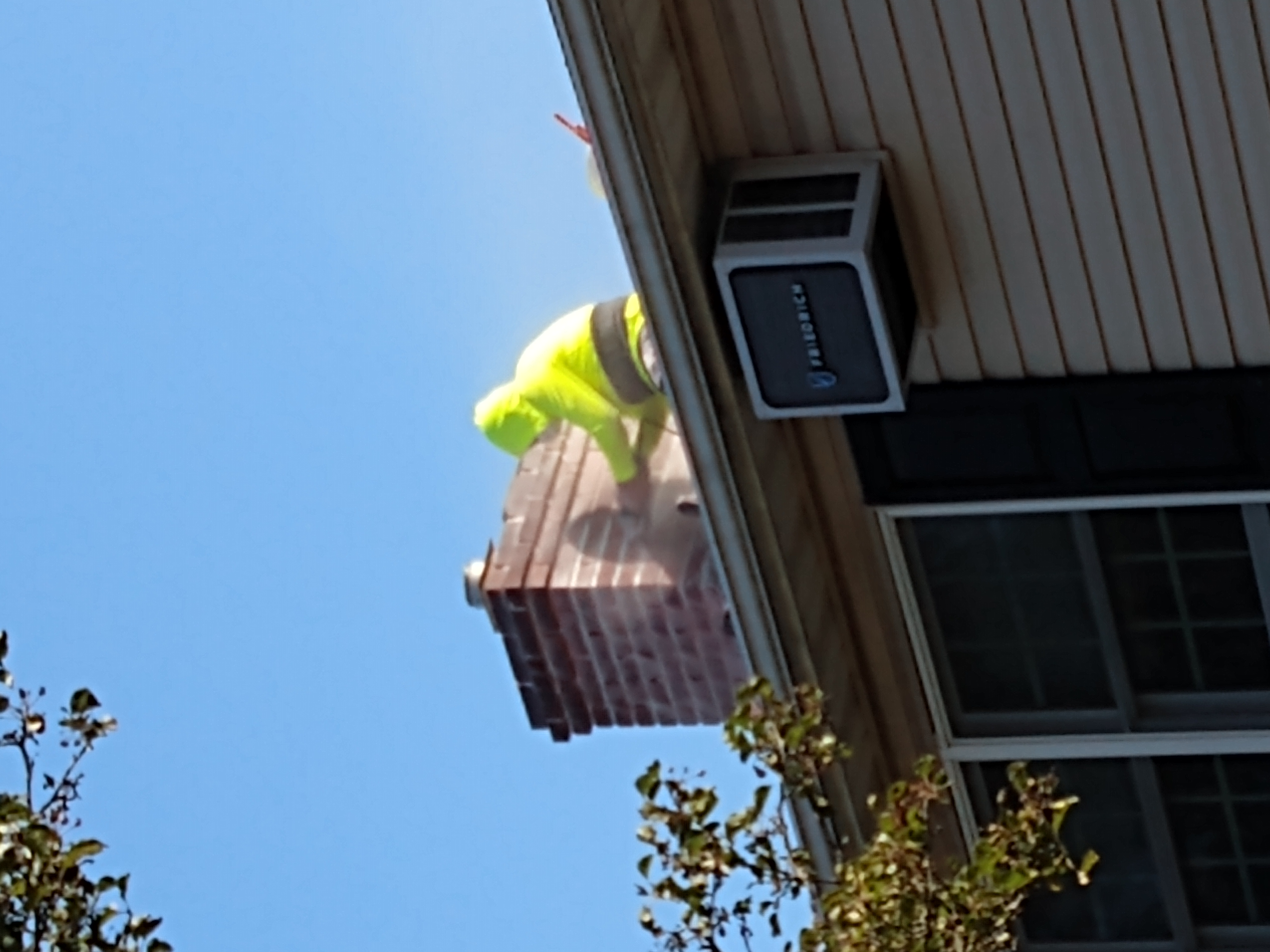 Chimney tuckpointing and mortar repair in East Meadow, New York